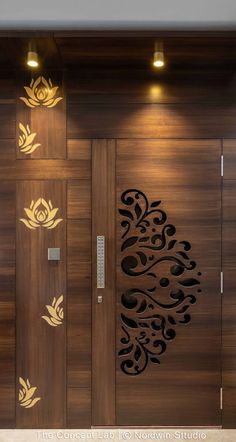 an elegant wooden door with decorative designs on it