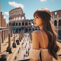 a woman with long hair standing in front of the colossion, looking at the sky