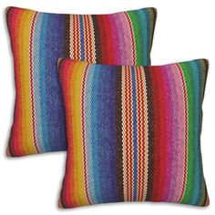 two multicolored pillows on white background