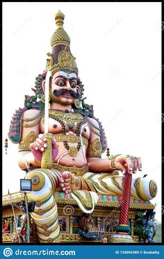 an elaborately decorated statue in the shape of a hindu god