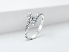 Minimalist Adjustable Dragon Rings, S925 Silver Adjustable Rings, Cute Ring, Real S925 Silver Rings, Animal Ring, Women Cute Gift What's included: 1 x Dragon Ring 1 x Jewellery Box DETAILS ⤵ *  Material: S925 Silver GUARANTEES ⤵ *  Free Shipping on orders over 30€ *  Ring is adjustable, no need to worry about the fit. *  14-Day Returns: If you're unhappy with your purchase, you can do returns or exchanges within 14 days of delivery. Dragon Design Ring Jewelry For Gift, Adjustable Dragon Design Jewelry Ring, Sterling Silver Ring With Dragon Design For Gift, Dragon Rings, Adjustable Silver Snake-shaped Ring, Rings Cute, Silver Dragon Design Collectible Jewelry, Cute Ring, Animal Ring