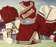 a cheerleader uniform is displayed on a table