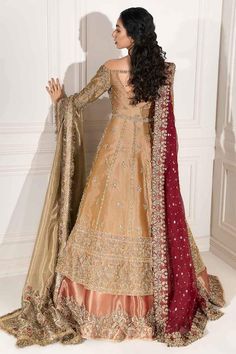 Elegant goldenrod tissue Pishwas with full sleeves, paired with a rust tissue lehenga. Accentuate your look with an additional goldenrod tissue dupatta. Complete the ensemble with a deep cardinal organza dupatta. Explore our collection of long Anarkali dresses for festive events, featuring mirror work, sequins, and flared bottoms. Choose Anarkali suits with net sleeves or frocks for bridesmaids or formal gatherings.An exquisite ensemble unfolds, featuring a Goldenrod Tissue Pishwas adorned with Tissue Lehenga, Long Anarkali Dress, Tissue Dupatta, Bridle Dress, Flared Shirt, Tissue Fabric, Nikah Dress, Long Anarkali, Bridal Shawl