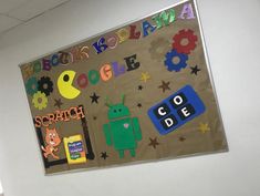 a bulletin board that has various items on it and the words google spelled in different languages