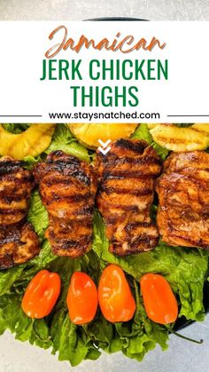 grilled chicken thighs on lettuce with tomatoes and carrots