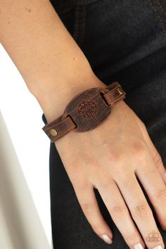 All Fine and DANDELION Brown Urban Bracelet - Paparazzi Accessories  Stamped in a rustic dandelion decoration, a piece of brown leather is studded in place across the front of a distressed leather band for a whimsically southern look. Features an adjustable sliding knot closure.  ﻿All Paparazzi Accessories are lead free and nickel free!  Sold as one individual bracelet. Leather Art Handmade, Adjustable Sliding Knot, Sliding Knot Closure, Photography Bags, Dandelion Designs, Brown Leather Bracelet, Brown Bracelet, Turquoise Bead Bracelet, Purple Rhinestone