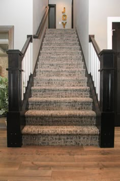 a set of stairs leading up to the second floor