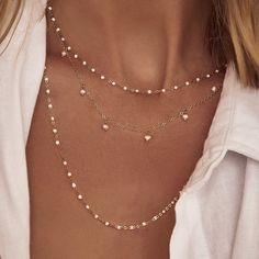 Stacking dreams are made from our gorgeously elegant Peggy Necklace. A simple dainty chain, featuring on trend enamel beads throughout, the Peggy Necklace is the versatile piece for all summer occasions. Featuring a 20cm chain extension, Peggy can be worn as a short choker style necklace with a long back chain (perfect for an open back top) or wear it as an extra long stacking necklace for an edgier look.  14k Gold (1 micron plating) Stainless Steel Base Enamel E-coating for a premium finish Lea Ethereal Style, Back Chain, Choker Style Necklace, Stacked Necklaces, Open Back Top, Enamel Beads, Dainty Chain, Enamel Necklaces, Skin Care Gifts