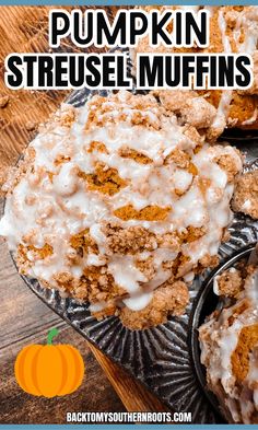 pumpkin streusel muffins with white icing on top and an orange pumpkin in the background