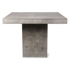 a concrete table with a square shaped base