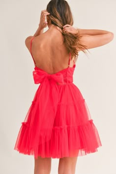 This Tulle Mesh Bow Back Mini Dress features adjustable spaghetti straps, a ruffle tiered design, and a front bust ruched detail. The back showcases a large self tie bow and exposed zipper, while the dress is fully lined for added comfort. Perfect for weddings, engagements, and special occasions. Valentine Day Dress, Spring Fling Dress, Hoco Dresses Red, Semi Dresses, 8th Grade Dance, Tulle Mini Dress, Mesh Bows, Valentines Day Dresses, Hoco Dress