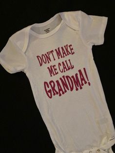 "A funny designed Onesies® features the phrase \"Don't Make Me Call Grandma\". Nothing matters more than a baby's comfort, and this one piece is the right choice for all active babies. The envelope neckline and three snap leg closure ensure comfort throughout the day. This is a perfect gift for Mom, Grandma, Baby Shower Gift or just because for that Little One! These gender neutral Gerber brand Onesies® are incredibly comfy! Both the bodysuits and t-shirts are printed on 100% cotton for a super Funny Short Sleeve Onesie With Letter Print, Playful White Onesie With Name Print, Cotton Bodysuit With Letter Print For Playtime, Short Sleeve Onesie With Funny Text For Birthday, Funny Text Short Sleeve Onesie For Birthday, Funny Short Sleeve Bodysuit With Letter Print, Cotton Onesie With Letter Print For Playtime, Funny Short Sleeve Letter Print Bodysuit, Casual Short Sleeve Onesie With Funny Text For Birthday