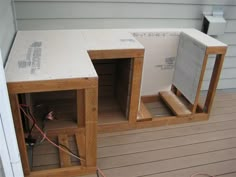 the inside of an unfinished house with electrical wires and boxes in place on the floor