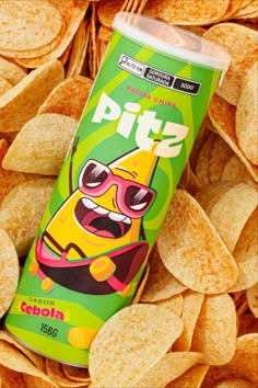 a can of pita chips sitting on top of a pile of tortilla chips