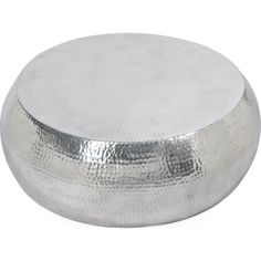 a round metal object on a white background