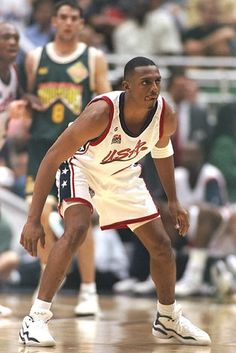 a basketball player is standing on the court