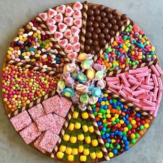 a platter filled with lots of different types of candy