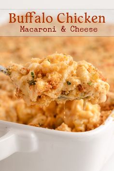 a spoon full of macaroni and cheese being lifted from a casserole dish