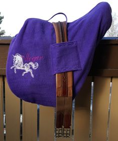 a purple horse saddle with the name morgan on it