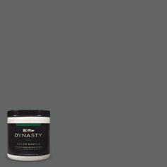 a can of dymasty paint on a grey background