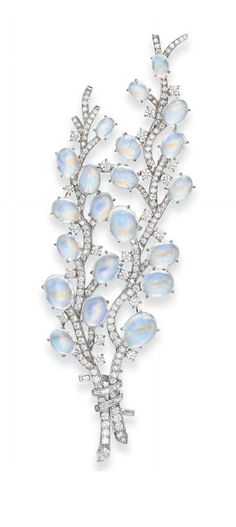 A MOONSTONE AND DIAMOND 'PUSSY WILLOW' SPRAY BROOCH, BY TIFFANY & CO. Tiffany & Co. black suede case Signed T