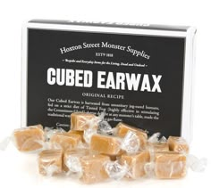 cubed earwax in a box on a white background