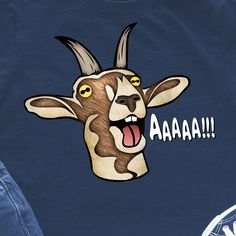 a blue shirt with an image of a goat's head and the words aaaa on it