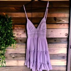 Beautiful Never Worn Mini Sun Dress Perfect For Summer. Pair With Your Favorite Cowgirl Boots Or Sandals. Tie Back With Stretchy Waist. I’m 5’10 , Hits Mid Thigh. Purple Mini Sundress, Lavender Mini Dress With Spaghetti Straps For Summer, Purple Mini Dress For Brunch, Lavender V-neck Mini Dress For Beach, Feminine Lavender Dress For Day Out, Chic Lavender Beach Dress, Lavender Sleeveless Dress For Brunch, Purple V-neck Sundress For Spring, Lavender Summer Dress For Brunch