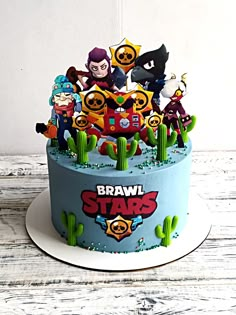 a birthday cake with cartoon characters on it