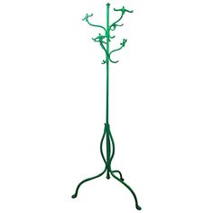 a green metal coat rack with three birds on it's top and two legs