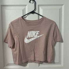 Pink Nike Loose Fit Cropped Tee,In Very Good Condition! Size Small Never Worn 100% Cotton Casual Logo Print Crop Top For Spring, Casual Spring Crop Top With Logo Print, Nike Basic Tops For Spring, Trendy Nike Short Sleeve Tops, Nike Trendy Top For Spring, Nike Basic Tops With Letter Print, Nike Casual Tops With Letter Print, Trendy Nike Tops With Graphic Print, Nike Basic Top With Graphic Print