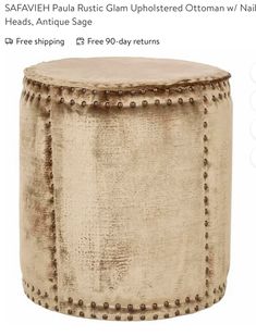 a round ottoman with studs on the top and bottom is shown in beige velvet