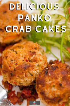 delicious panko crab cakes on a plate with a fork and salad in the background