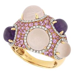 This large unique cocktail ring features 2 natural amethyst and 3 pink quartz, weighing 2.31ct and 6.72ct respectively, surmounted with pink sapphire (1.53ct) and diamonds (0.33ct), mounted in 18 karat rose gold. O’Che 1867 is renowned for its high jewellery collections with fabulous designs. Our designs reflect the cultural and aesthetic value of its origin – Macau, where East meet West, with the inspiration from the beauty of oriental and Roman art. The finest hand selected precious stones ins Pink Gold Ring, Pink Gold Rings, Gold Opal Ring, Rose Gold Opal Ring, Retro Ring, Roman Art, Opal Ring Gold, High Jewellery, Gold Cocktail Ring