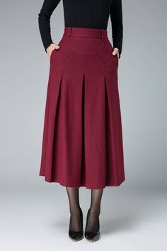 "Our wine red maxi romantic skirt gives you a long and lithe look in a slimming A-line cut with a fitted waist and pleating from the hip part. Details: * wine red fabric, polyster lining * fitted waist * right zipper closure * two seam pockets * midi length CUSTOM MADE SERVICE If you * Need a tailored clothes with your body measurement * Need a Better fit * Can't find your size in the size Chart * Make this clothes in other Color * Change the style of this clothes I can do it for you, It will ne Wine Red Skirt, Midi Wool Skirt, Romantic Skirt, Long Wool Skirt, Ladies Skirts, Skirt Office, Red Midi Skirt, Skirt A Line, Tailored Clothes