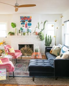 a living room filled with furniture and a fire place