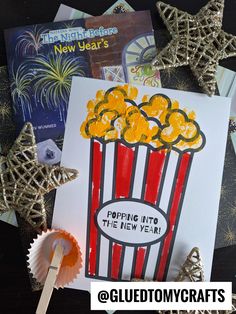 a close up of a card with popcorn on it