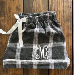 Monogrammed Flannel Shorts These shorts are darling and 100% cotton flannel.  Little details count, the shorts feature a drawstring cord, satin piping on leg opening, and wasteland with elastic.   Sizing: XXS - XXL XXS - 0 XS -2 Small 4-6 Medium 8-10 Large 12-14 XL 16 XXL 18 Customize by adding name or initials Personalization Information At checkout, please leave initials in the following format first -last- middle ALL items will be personalized EXACTLY as initials are submitted at checkout,  M Plaid Pajama Shorts, Monogrammed Pajamas, Flannel Shorts, Pajama Bottoms Womens, Unisex Pajamas, Plaid Pajama, Womens Pajama Shorts, Plaid Pajama Pants, Adult Pajamas