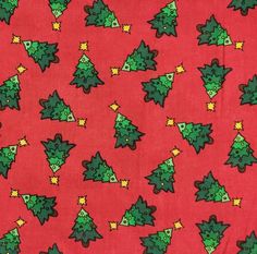 a red background with green and yellow christmas trees