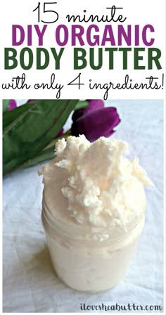 a jar filled with whipped cream sitting on top of a table next to purple flowers