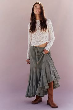 A true classic in everyone’s wardrobe, this stunning skirt from our free-est collection will turn heads from this season to the next. **Fit:** Low-slung, billowy A-line fit **Features:** Pull-on design, drawstring waist, curved tiered design at the hem **Why We ❤ It:** Sleek with a tucked-in bodysuit or laid-back with a simple tee, this style has endless ways to wear. | Like A Mermaid Maxi Skirt by free-est at Free People in Green, Size: S Green Flowy Midi Skirt, Style Icons Boho, Modesty Journey, Western Flowers, Classy Trendy Outfits, Winter Hippie, Siren Costume, Mermaid Maxi Skirt, Design Skirt