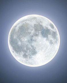 the full moon is seen in the sky with no clouds on it's side