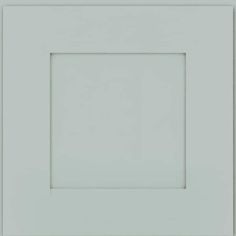 a white square frame on the wall