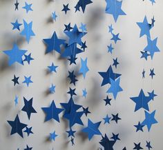 blue paper stars hanging from the ceiling