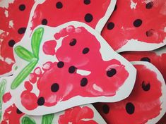 watermelon stickers with black dots on them are arranged in the shape of hearts