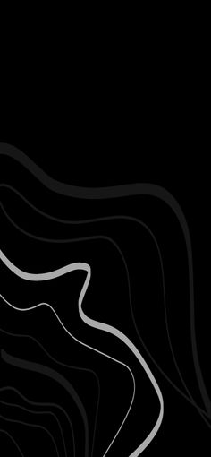 an abstract black and white background with lines in the shape of a curved curve on top of each other