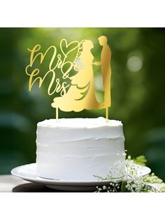 a wedding cake topper that says mr and mrs