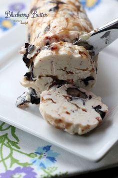 a white plate topped with ice cream and chocolate