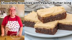 a woman standing in front of a plate of brownies with peanut butter toppings