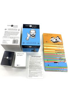 several different types of business cards on a white surface with information about each card in the box